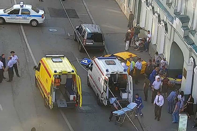 In this image provided by Moscow Traffic Control Center Press Service, ambulance and police work at the site of an incident after a taxi crashed into pedestrians on a sidewalk near Red Square in Moscow, Russia, Saturday, June 16, 2018. Police in Moscow say at least seven people have been injured when a taxi crashed into pedestrians on a sidewalk near Red Square. (Moscow Traffic Control Center Press Service via AP)
