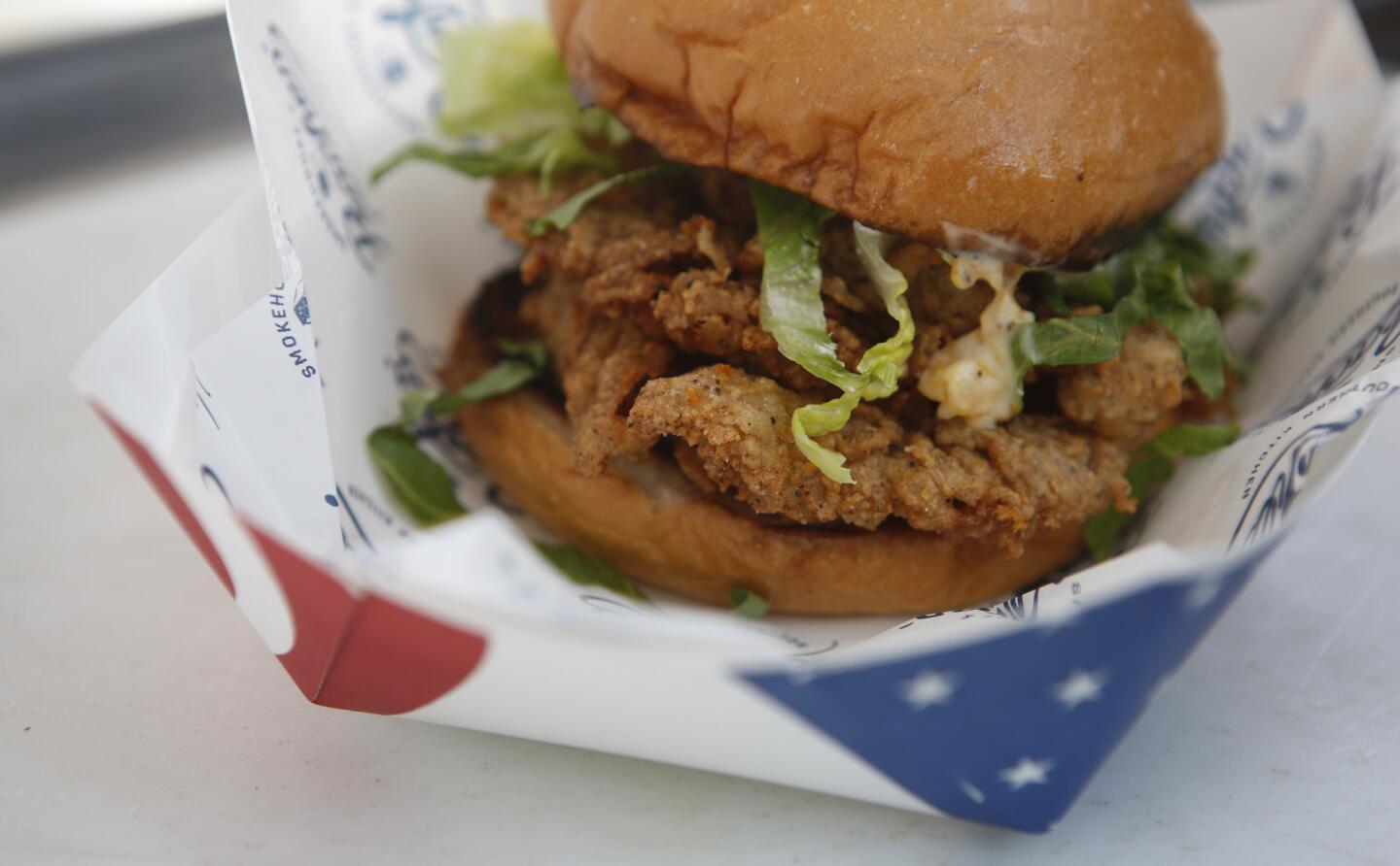 The country-fried steak sandwich at Peaches', a food truck specializing in Southern food.