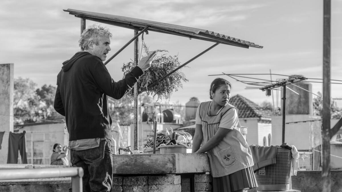 Filmmaker Alfonso Cuaron on the set of "Roma."