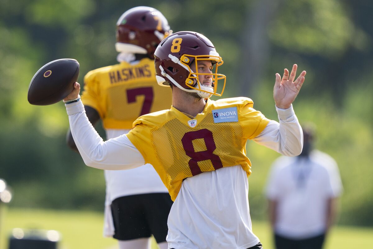 Washington quarterback Kyle Allen (8) prepares to throw in practice.