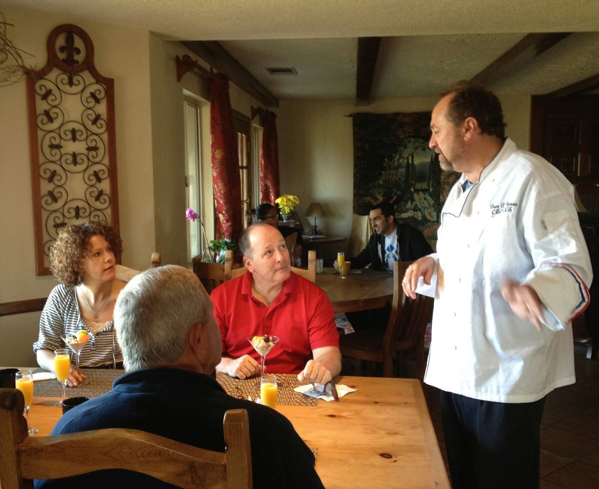 Chef Dean Thomas chats with guests at Europa Village in Temecula. Jen Kopack
