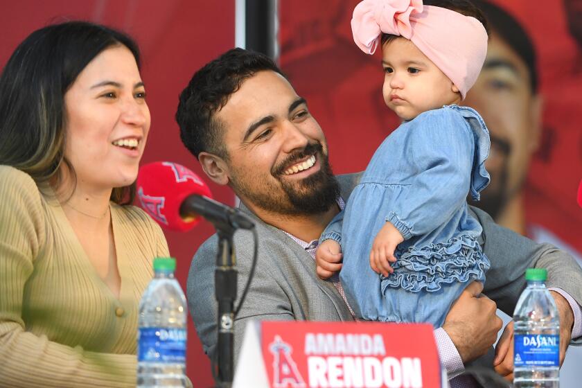 ANAHEIM, CA - DECEMBER 14: Los Angeles Angels Anthony Rendon #4 with his wife Amanda and daughter Emma during an introductory press conference at Angel Stadium of Anaheim on December 14, 2019 in Anaheim, California. (Photo by Jayne Kamin-Oncea/Getty Images)