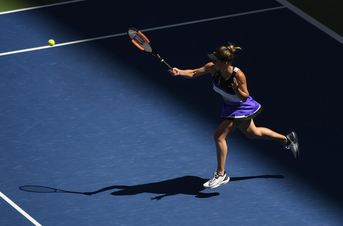 Elina Svitolina returns a shot to Johanna Konta during the quarterfinals of the U.S. Open on Tuesday.