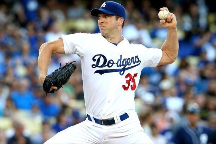 Dodgers pitcher Chris Capuano, who went seven innings in his previous start against the Padres Saturday, couldn't make it out of the second inning against the Reds on Friday because of an injury.