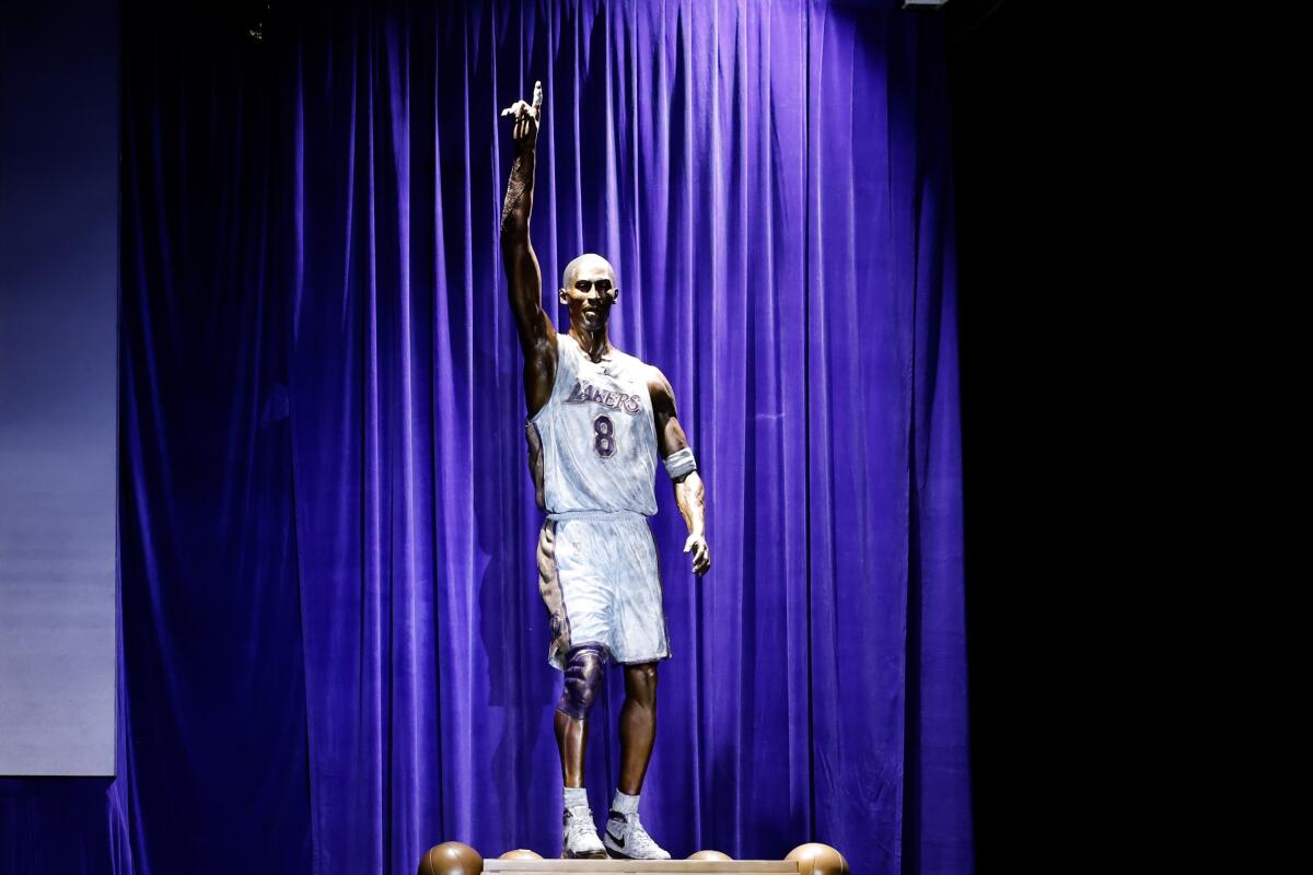The Lakers unveiled a 19-foot, 4,000-pound bronze statue of Kobe Bryant during a ceremony outside Crypto.com Arena.