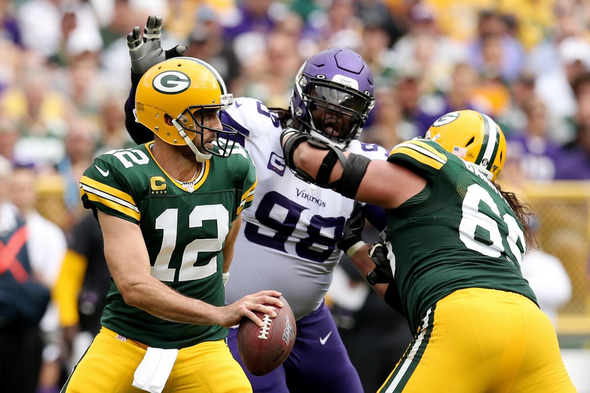 Linval Joseph pressures Green Bay quarterback Aaron Rodgers