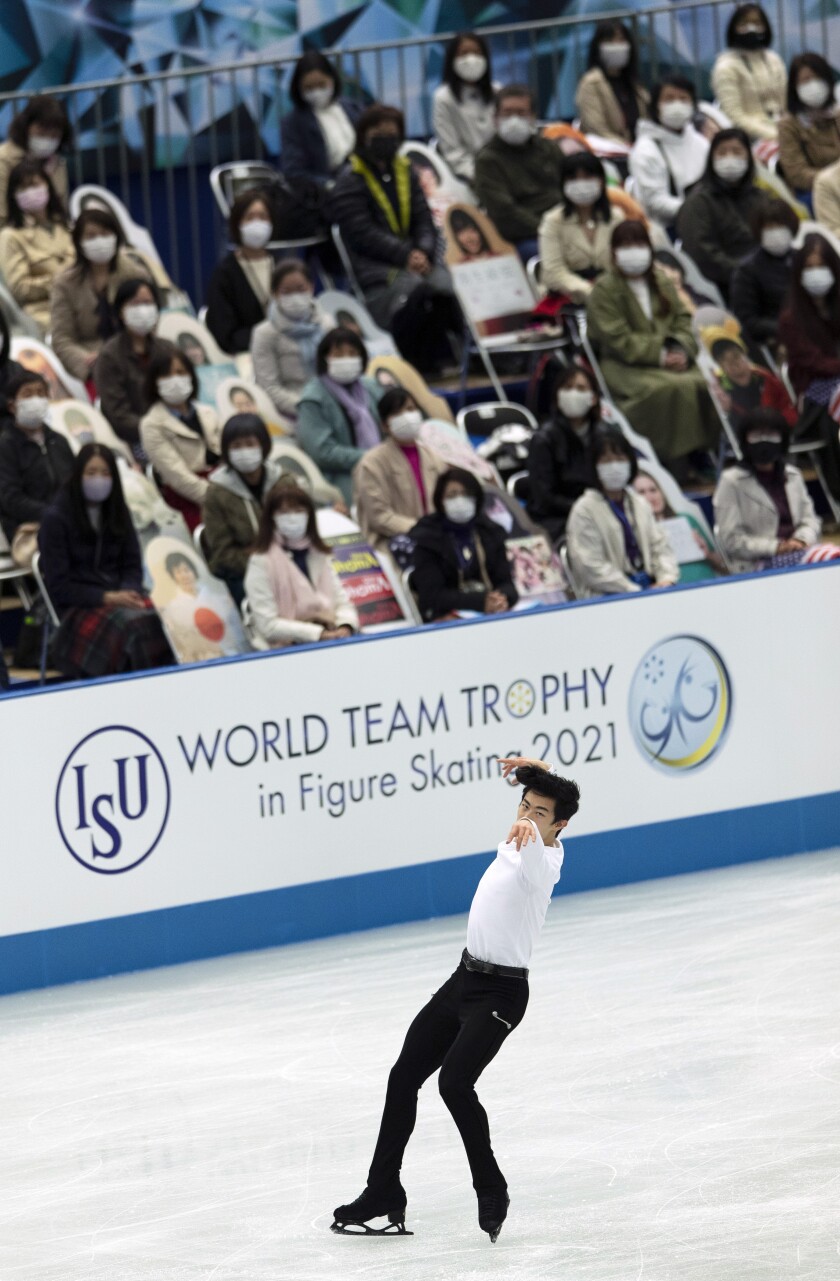 USA's Nathan Chen performs during the men's short program of the ISU World Team Trophy figure skating competition in Osaka, western Japan, Thursday, April 15, 2021. (AP Photo/Hiro Komae)