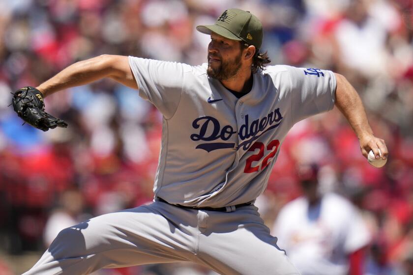 Los Angeles Dodgers starting pitcher Clayton Kershaw throws during the first inning.