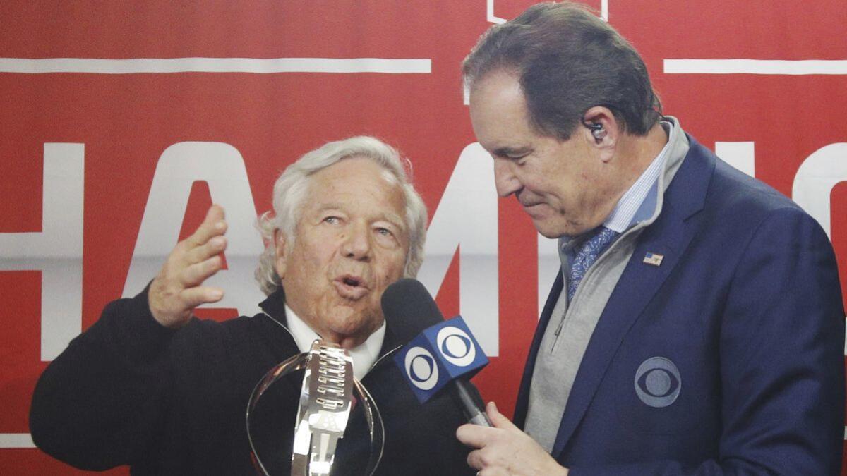 New England Patriots owner Robert Kraft talks to CBS' Jim Nantz after receiving the Lamar Hunt Trophy following his team's win over the Kansas City Chiefs in the AFC championship game on Jan. 20.