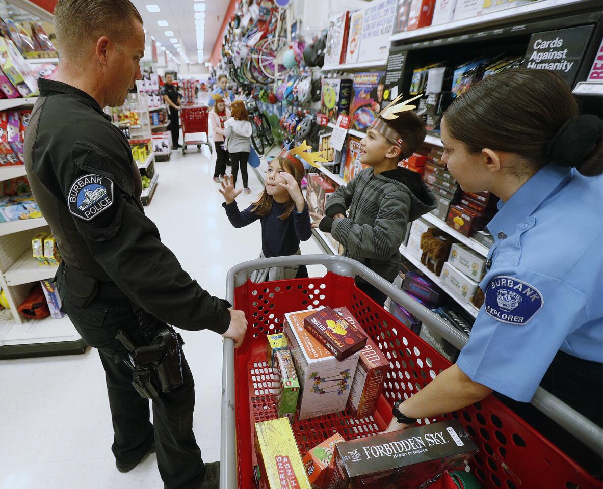 Photo Gallery: Burbank Boys and Girls Club children match up with Burbank Police Department for annual Heroes and Helpers event