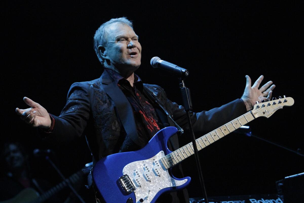 Glen Campbell, shown performing in 2011 at Club Nokia in Los Angeles, reportedly has been moved into an Alzheimer's disease care facility.