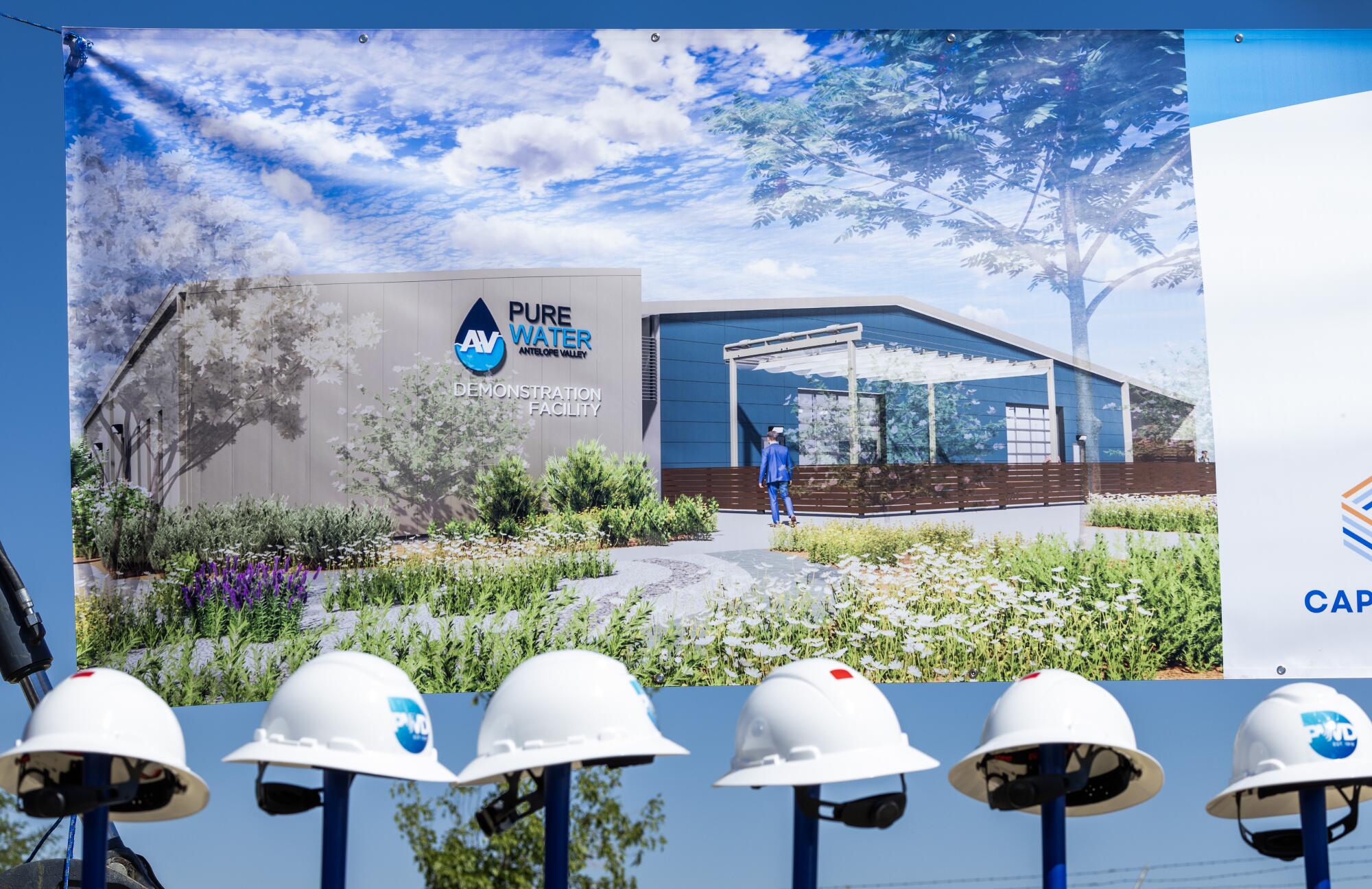 A rendering of Project Monarch facilities behind several white hard hats.