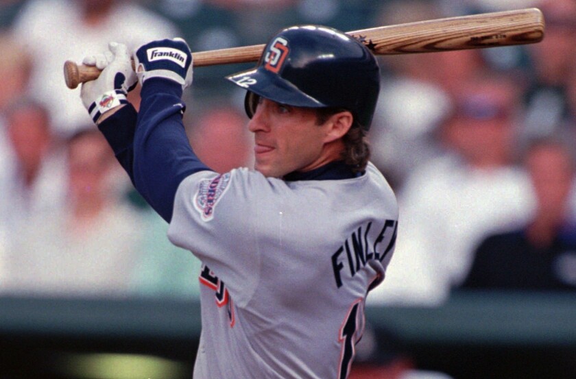 Padres' Steve Finley doubles at Denver's Coors Field in 1997.