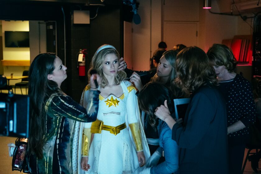 Starlight (Erin Moriarty) is attended to by a team of professionals before facing the public on "The Boys."