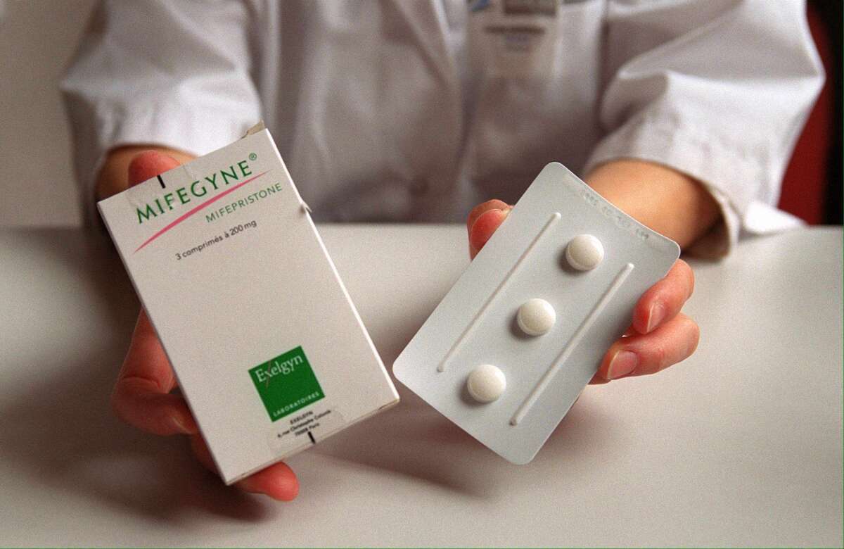 A nurse shows mifepristone, also known as the "abortion pill."