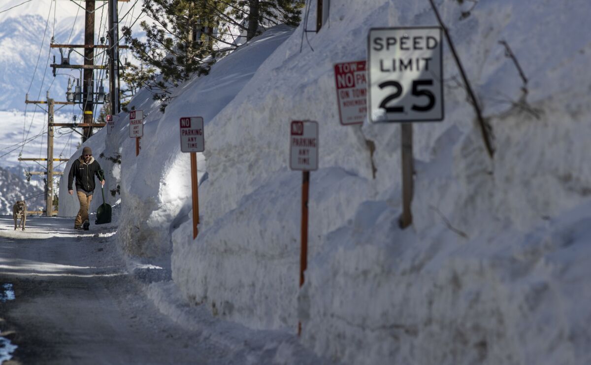 Snow is piled nearly 20 feet high along Davison Street in the town of Mammoth Lakes, which has had to deal with more snow than almost anywhere in the country with 635 inches.