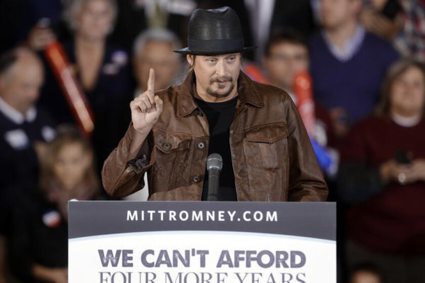 Pop music star Kid Rock speaks before introducing Republican vice presidential nominee Paul Ryan at a rally at Oakland University in Rochester, Mich.