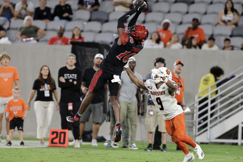 SAN DIEGO, CA - SEPTEMBER 02, 2023: The Aztecs' Noah Tumblin intercepts a pass intended for Idaho State's Alfred Jordan Jr. during the fourth quarter at Snapdragon Stadium in San Diego on Saturday, September 02, 2023. (Hayne Palmour IV / For The San Diego Union-Tribune)