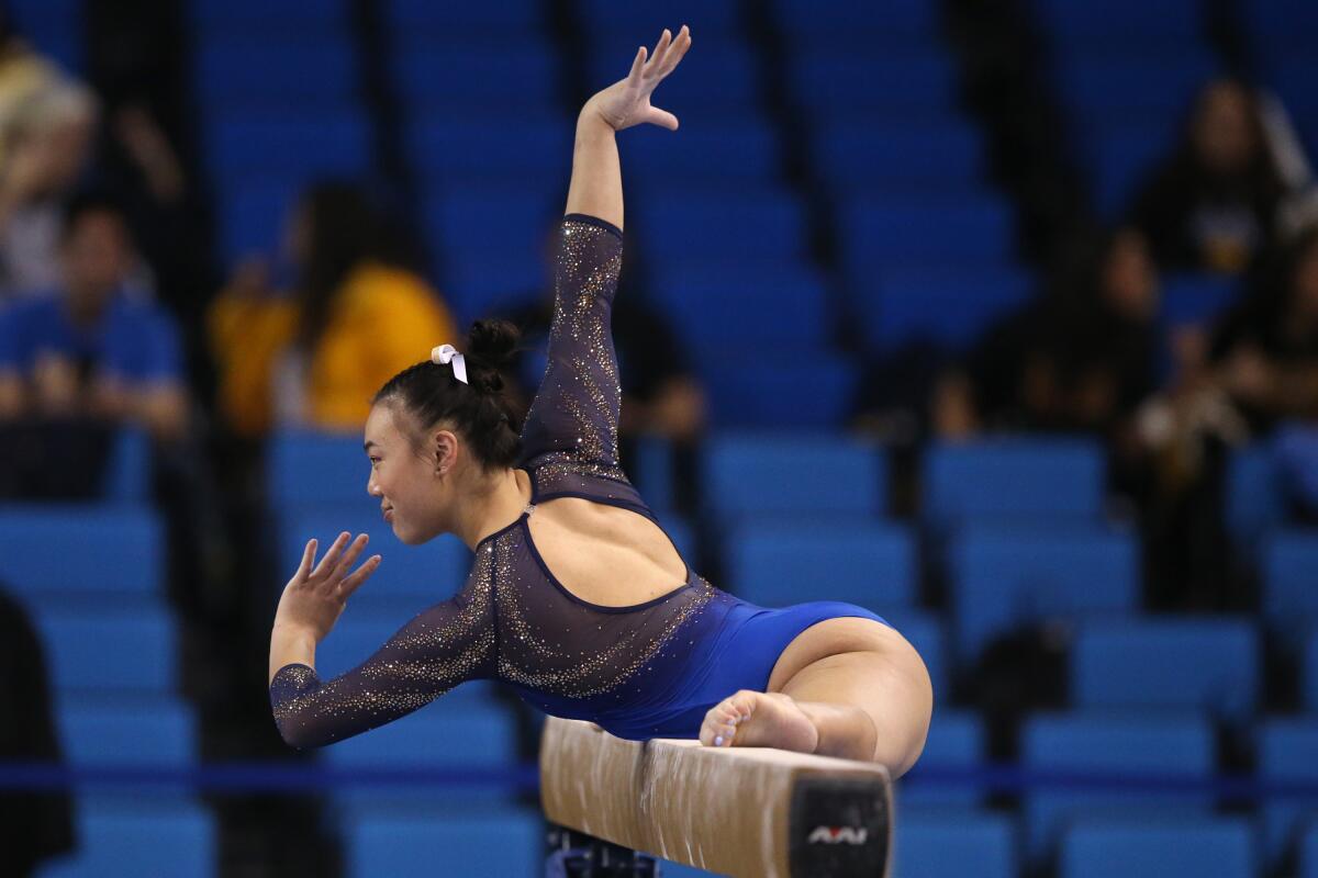 UCLA's Emily Lee competes on the balance beam in the NCAA regionals at Pauley Pavilion on Thursday night.