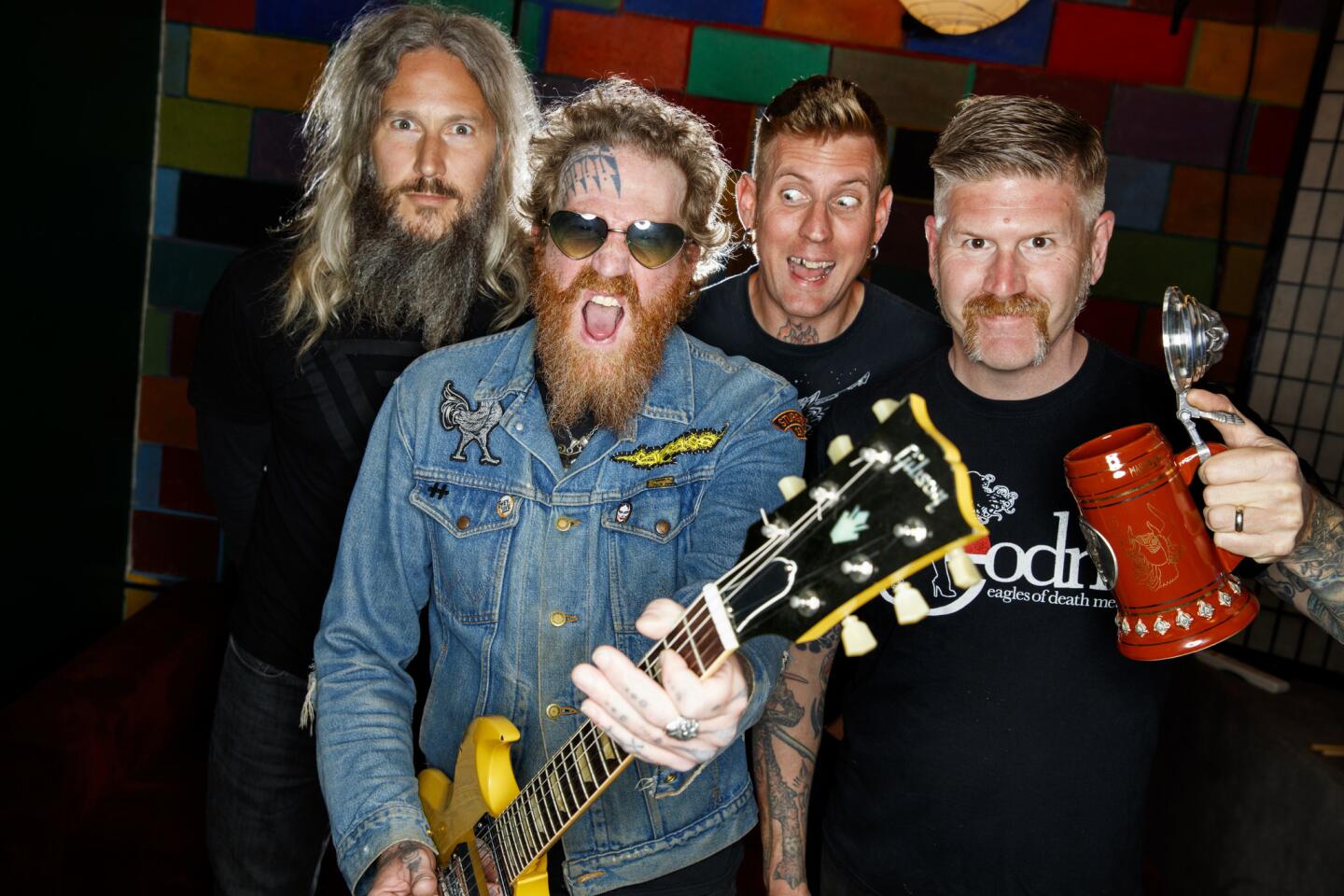 Heavy metal band Mastodon members, from left, Troy Sanders, Brent Hinds, Brann Dailor and Bill Kelliher before their performance at Amoeba Music in Hollywood. The band has a new album, "Emperor of Sand."