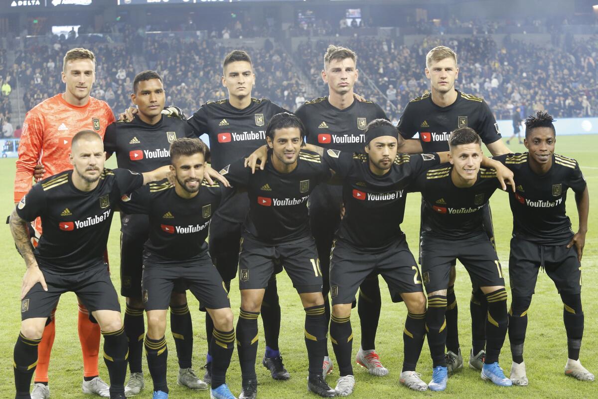 Los Angeles FC pose for photo prior to the MLS soccer Western Conference final between Seattle Sounders and Los Angeles FC, Tuesday, Oct. 29, 2019, in Los Angeles. Seattle Sounders won 3-1. (AP Photo/Ringo H.W. Chiu)