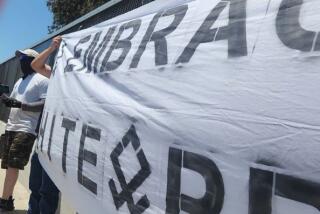 Photo of "Embrace White Pride" banner taken by Camille Katz.
