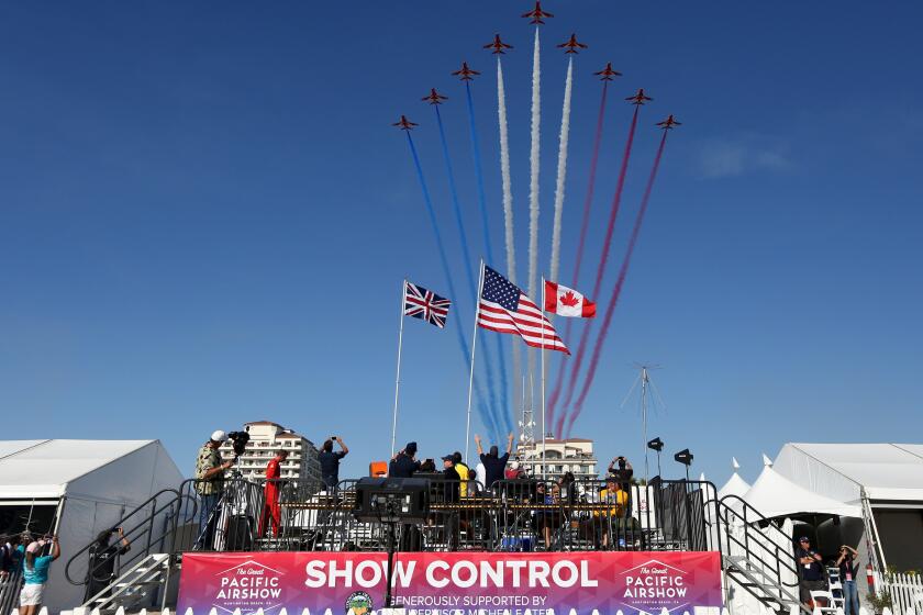 The Royal Air Force Red Arrows make a grand entrance at the Great Pacific Airshow, in Huntington Beach, on Saturday, Oct. 5, 2019.