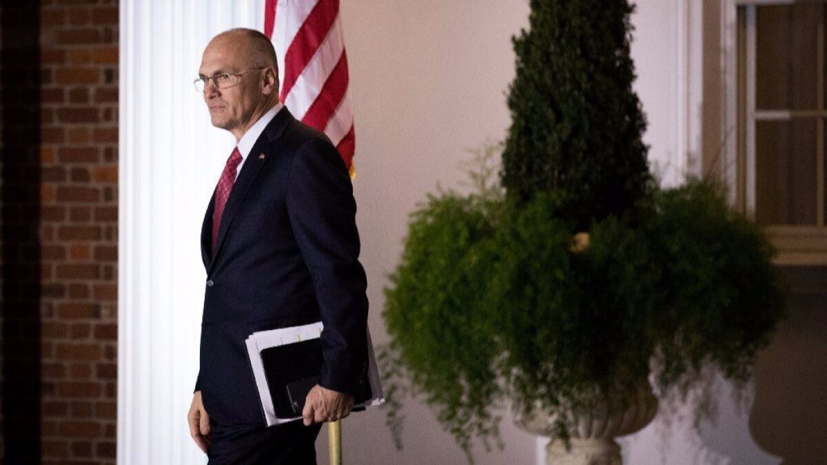 Andrew Puzder, chief executive of CKE Restaurants, exits after his meeting with president-elect Donald Trump at Trump International Golf Club, November 19, 2016 in Bedminster Township, New Jersey