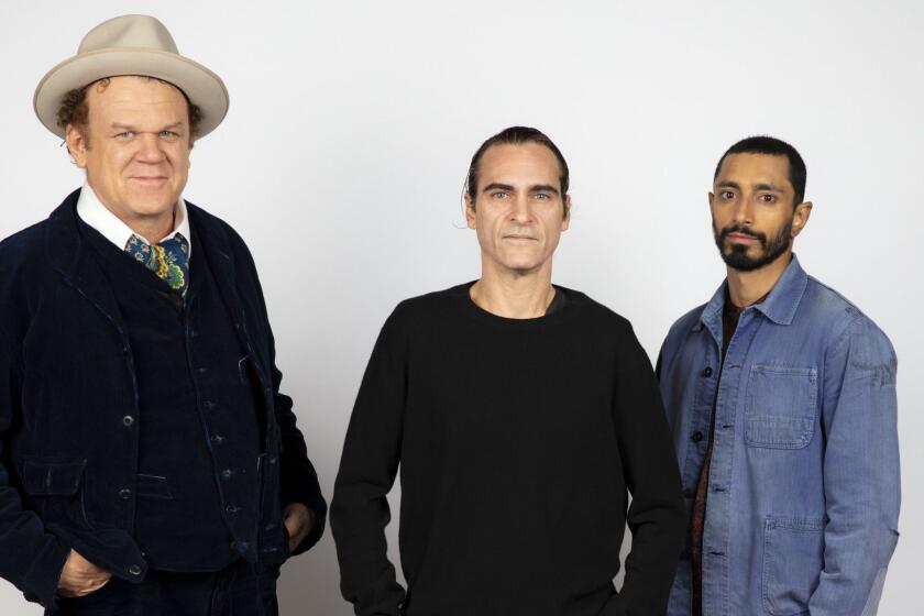 TORONTO, ONT., CA -- SEPTEMBER 09, 2018-- Actor/Producer John C. Riley, actor Joaquin Phoenix, and actor Riz Ahmed, from the film "The Sisters Brothers," photographed in the L.A. Times Photo and Video Studio at the 2018 Toronto International Film Festival, in Toronto, Ont., Canada on September 09, 2018 (Jay L. Clendenin / Los Angeles Times)