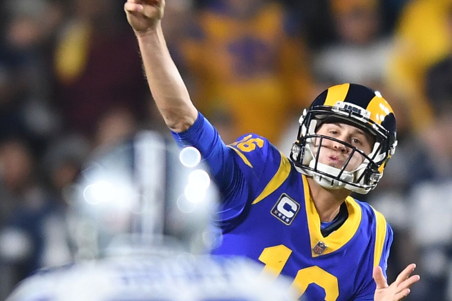 Rams quarterback Jared Goff unleashes a pass off against the Cowboys.