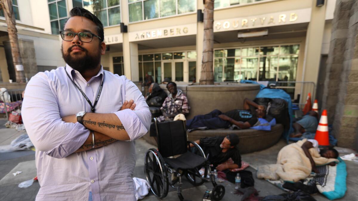 Vijay Gupta at the Midnight Mission on skid row in Los Angeles in October. A MacArthur Fellow and violinist, he is leaving the L.A. Phil after this week’s Brahms programs to devote himself full-time to his community projects.