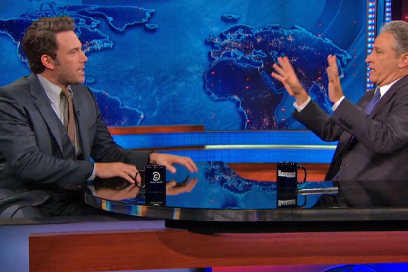 Ben Affleck talks with Jon Stewart on "The Daily Show" on Sept. 30.