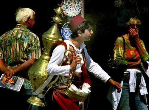 Muhammet Emre Akkas strolls the O.C. Fairgrounds in traditional costume selling lemonade to visitors at the Anatolian Cultures & Food Festival.