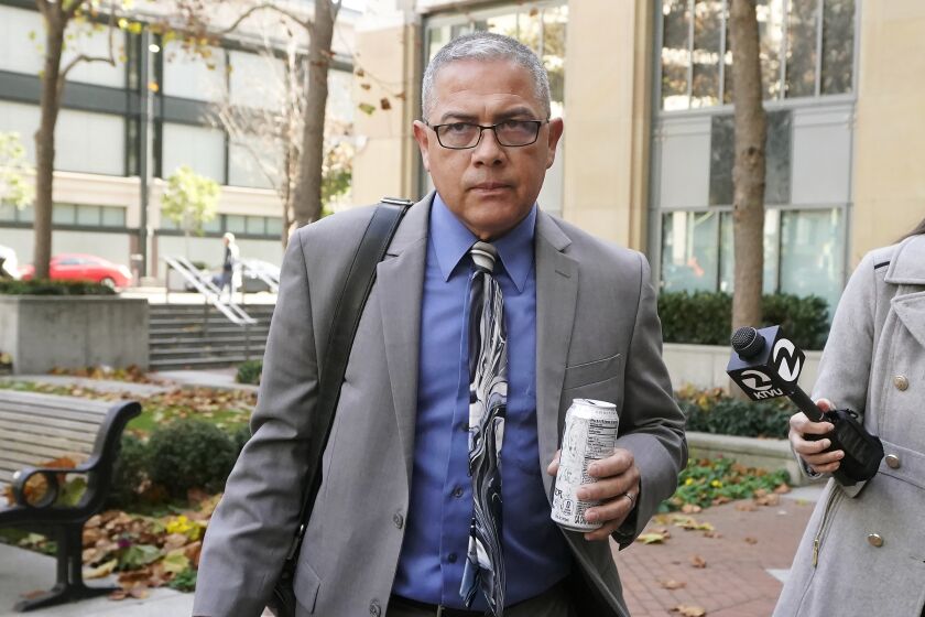 FILE - Ray J. Garcia leaves the Federal Courthouse in Oakland, Calif., on Nov. 28, 2022. The former warden of an abuse-plagued federal women's prison in the San Francisco Bay Area was sentenced Wednesday, March 22, 2023, to nearly six years in prison for sexually abusing incarcerated women. (AP Photo/Jeff Chiu, File)