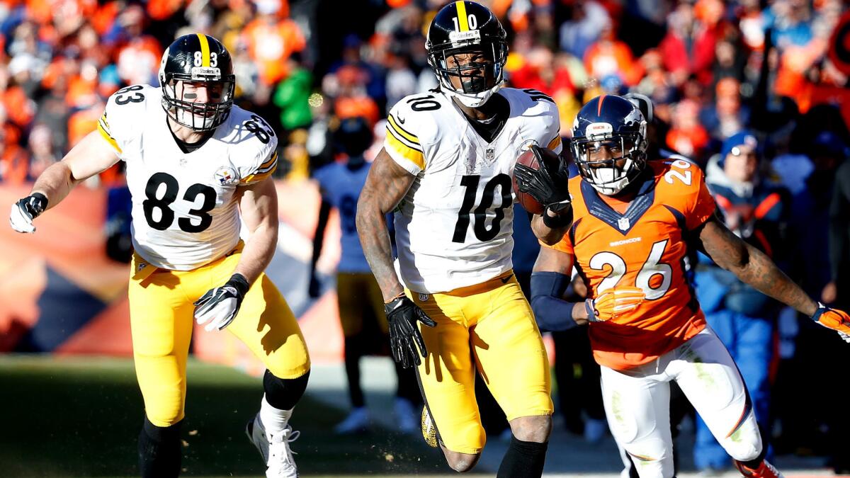 Steelers wide receiver Martavis Bryant (10) picks up 40 yards after making a reception against the Broncos in an AFC divisional playoff game on Jan. 17.