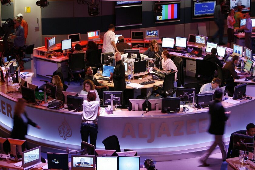 Al Jazeera's Qatar-based newsroom is seen in 2006. If Al Jazeera's stepped up presence in the United States can help huamanize the Arab and Islamic world, it can provide a badly needed bridge for peace and understanding.