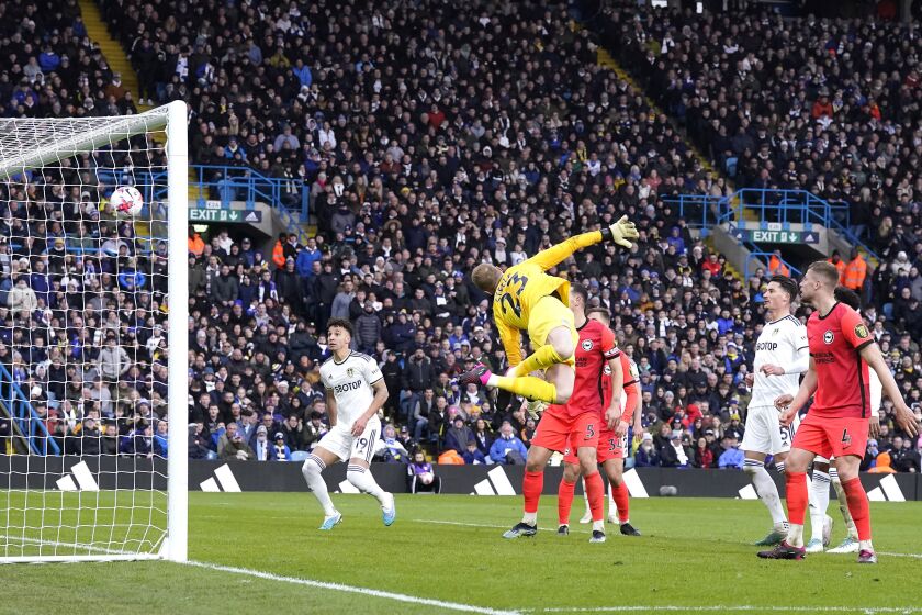 Leeds United's Jack Harrison scores his side's second goal of the game, during the English Premier League soccer match between Leeds United and Brighton and Hove, at Elland Road, in Leeds, England, Saturday March 11, 2023. (Danny Lawson/PA via AP)