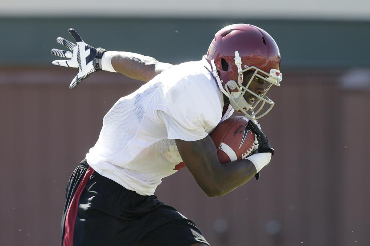 USC wide receiver Marqise Lee runs with the ball during practice.