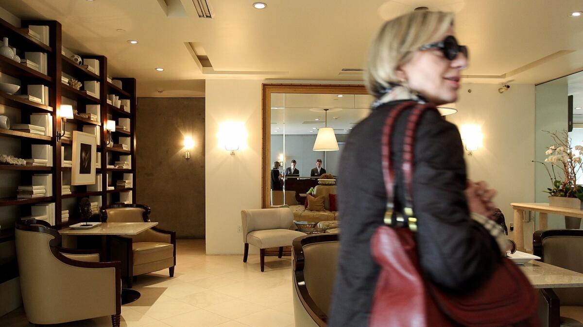 A guest in the lobby of the Luxe Hotel Rodeo Drive in 2012. The hotel will begin accepting Wechat Pay and Alipay in December.