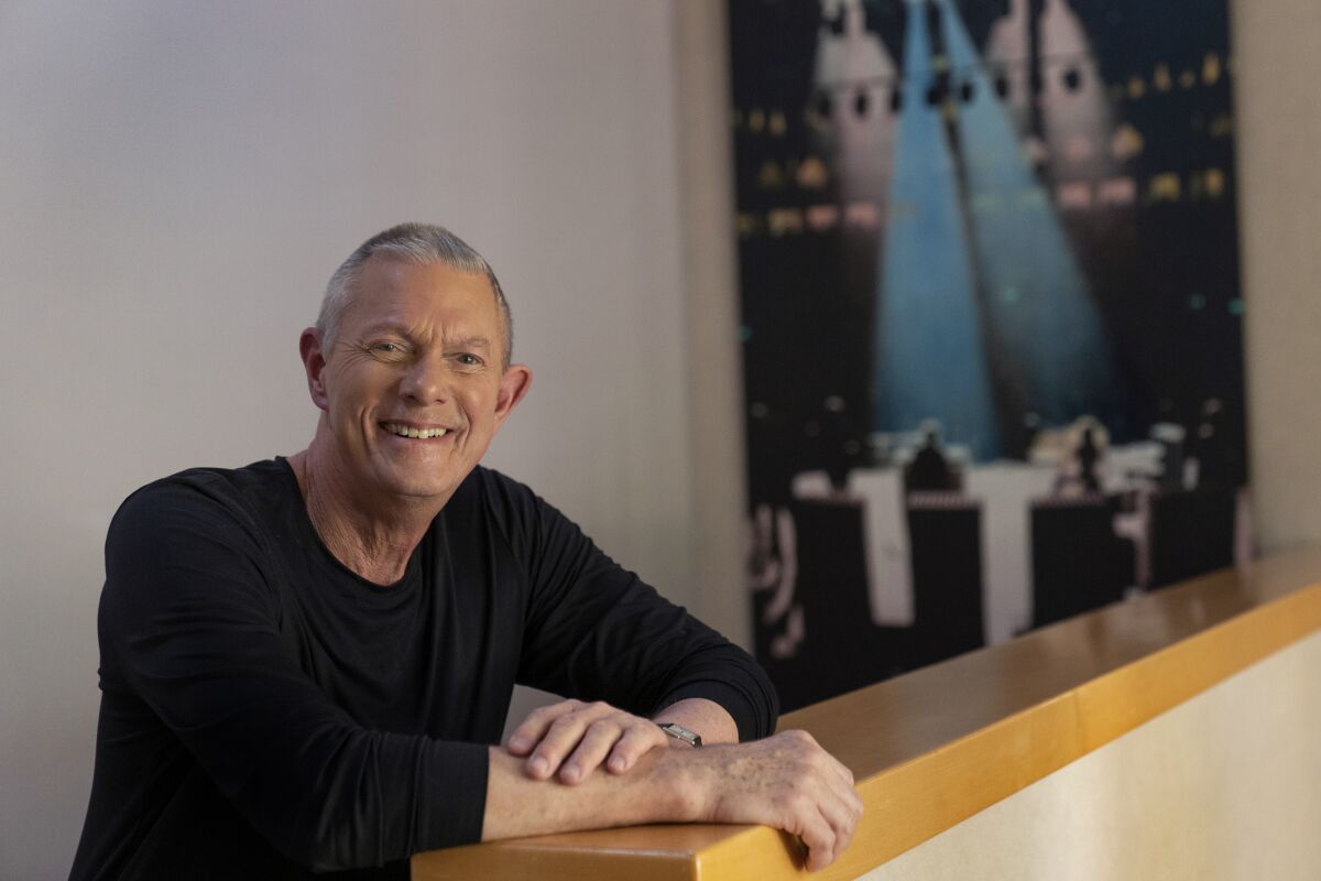 Richard Carpenter poses at his home in Thousand Oaks, Calif., on Friday, Sept. 10, 2021. A new book on the Carpenters takes a look back at nearly every rainy day and Monday of the legendary pop duo's career. "Carpenters: The Musical Legacy," meant to mark the 50 years since the duo's debut, was co-written by Carpenter, along with Associated Press journalist Mike Cidoni Lennox and Chris May. (AP Photo/Damian Dovarganes)