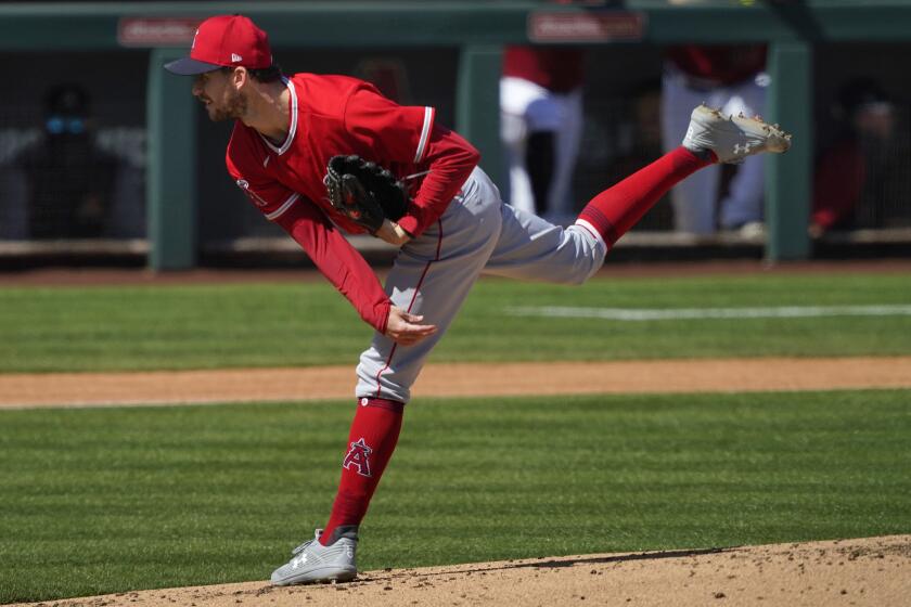 Los Angeles Angels starting pitcher Griffin Canning throws during the first inning of a spring training baseball game against the Arizona Diamondbacks, Thursday, March 4, 2021, in Scottsdale, Ariz. (AP Photo/Matt York)