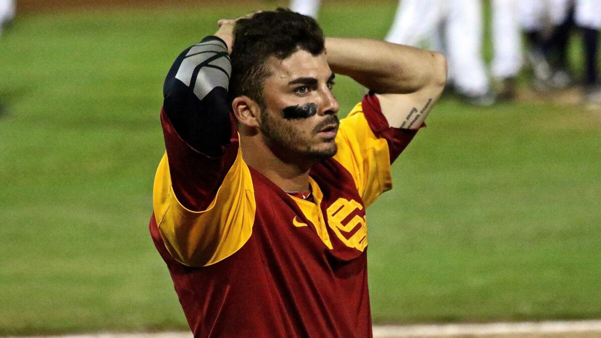 USC outfielder Bobby Stahel looks into the stands as the Trojans' season ends with a 14-10 loss in 11 innings to Virginia in the Lake Elsinore Regional.