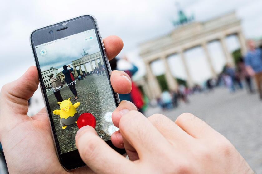 While gamers play "Pokemon Go" in countries where it's been released -- here a man plays near Berlin's Brandenburg Gate -- Chinese have been finding innovative ways to get their hands on the game.