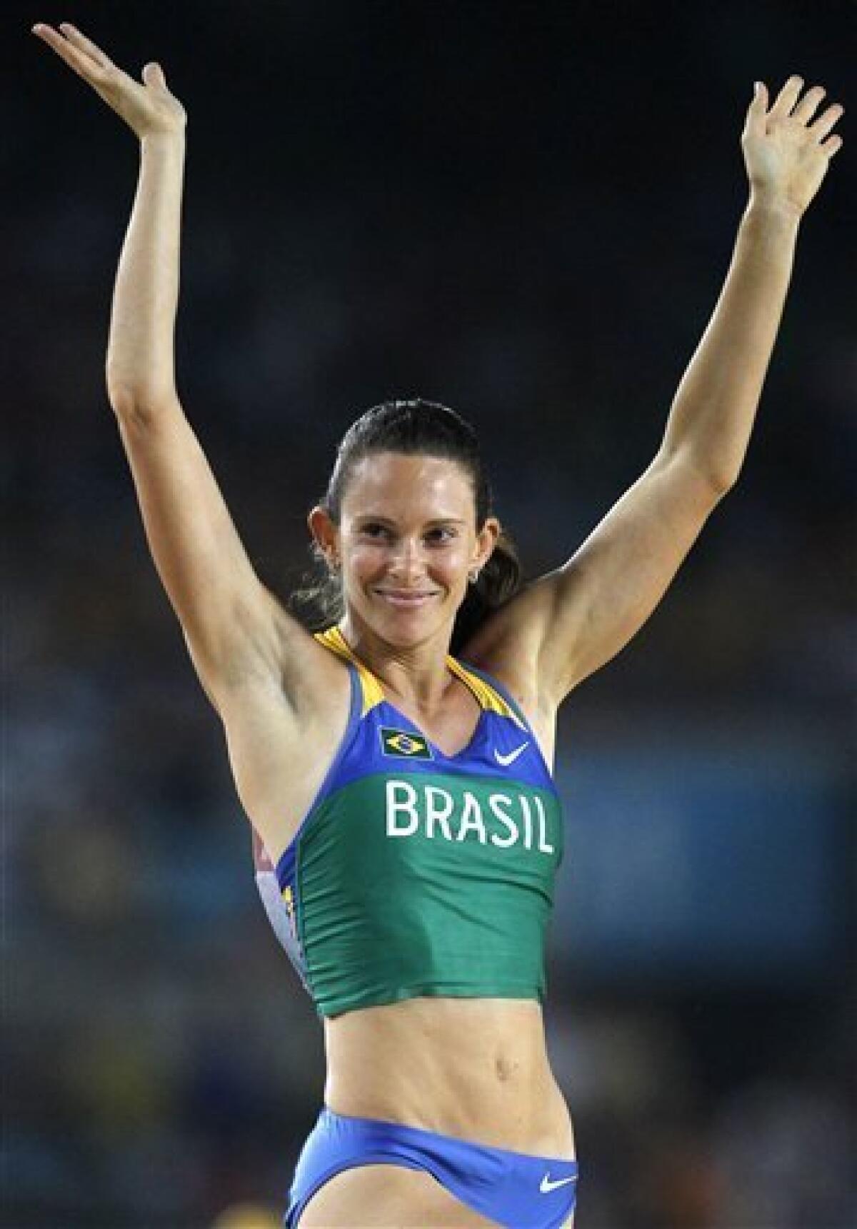 Brazil's Fabiana Murer reacts after clearing a bar in the Women's Pole Vault final at the World Athletics Championships in Daegu, South Korea, Tuesday, Aug. 30, 2011. (AP Photo/Kin Cheung)