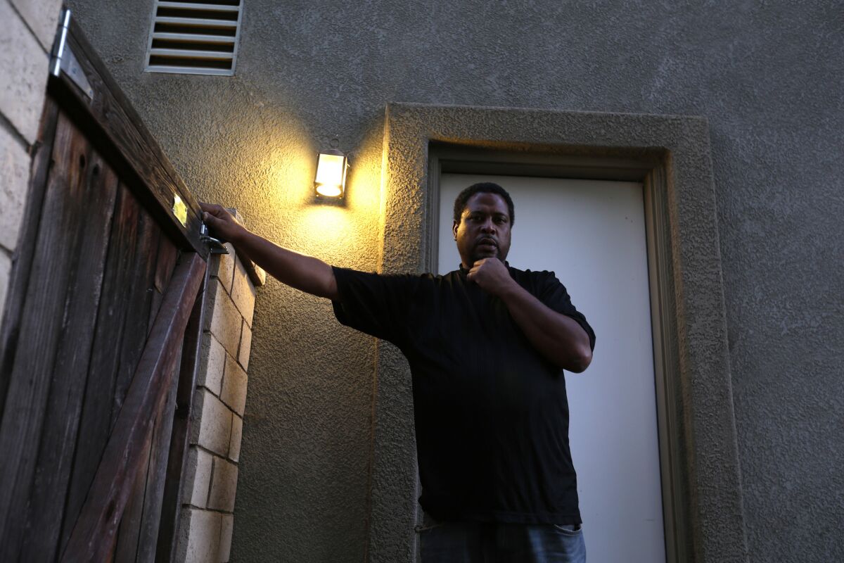 Fredrick Jefferson at the home in Corona where he is staying. Jefferson 46, is among millions of Californians who lost their driver's licenses because of unpaid traffic fines.