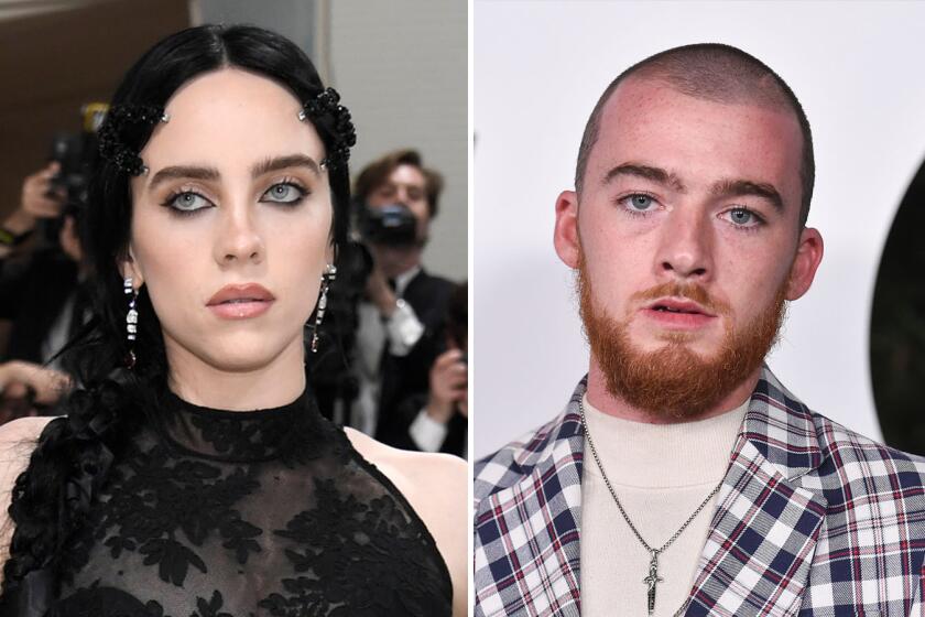 A picture of Billie Eilish with dark hair and a dark dress next to a picture of Angus Cloud in a plaid blazer and beige shirt