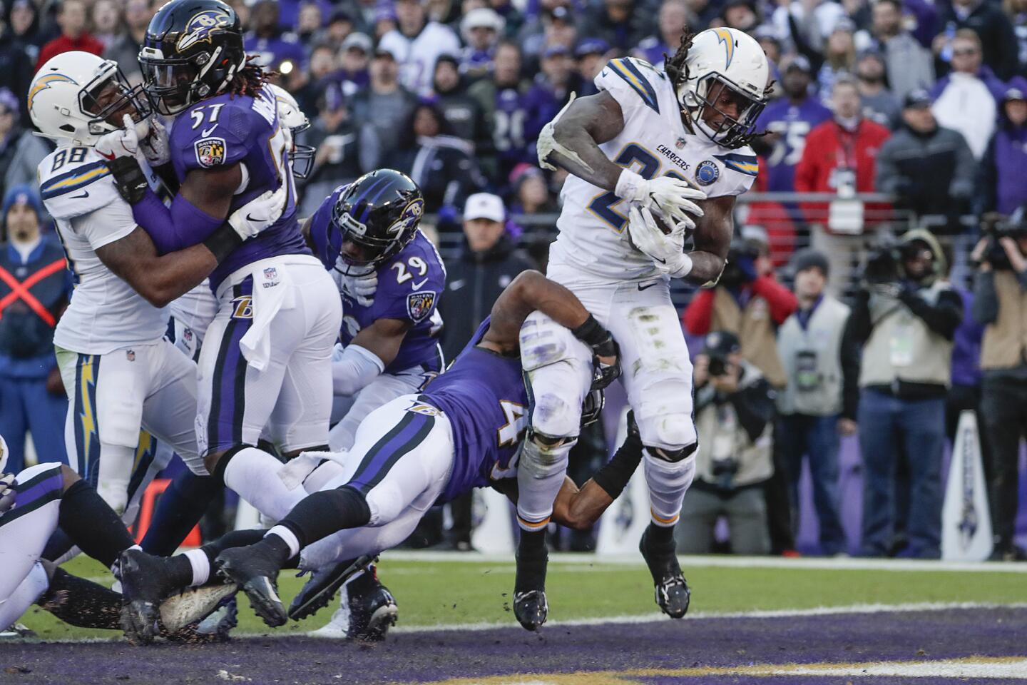 Chargers running back Melvin Gordon scores a touchdown early in the fourth quarter, on a fourth-down play near the goal line.