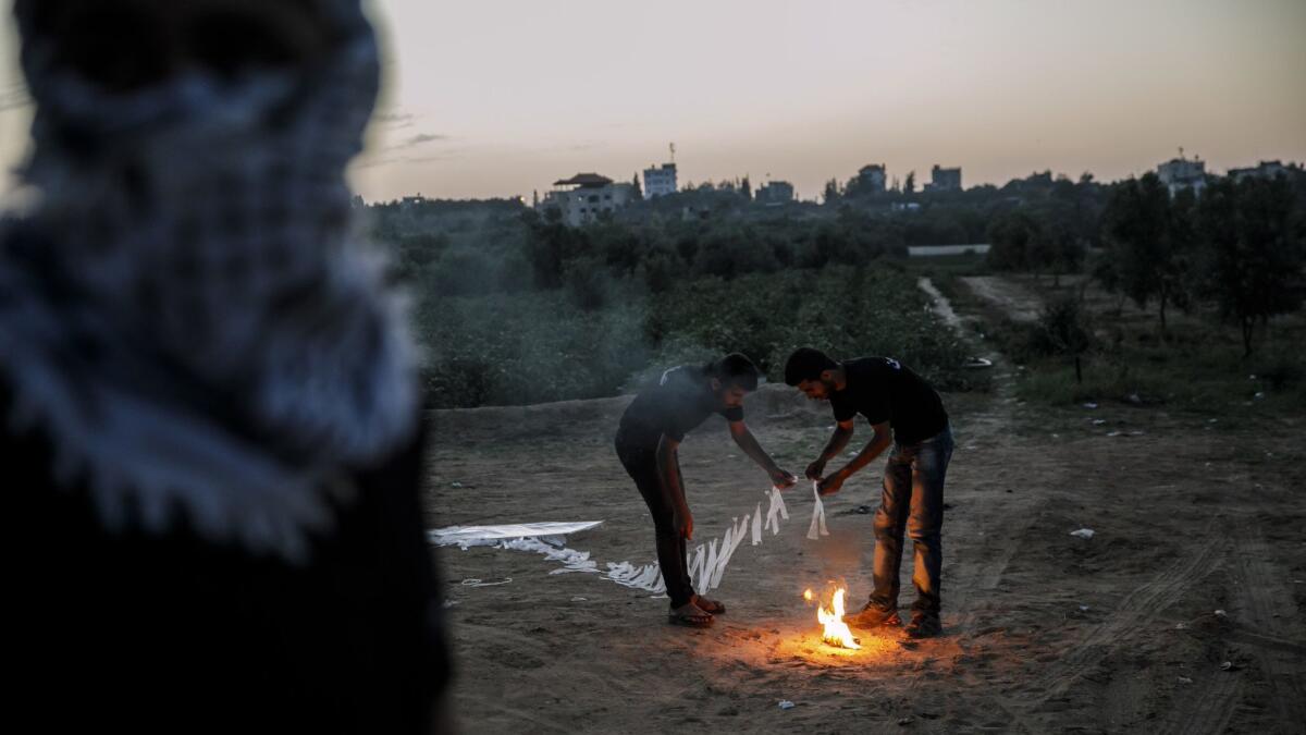 Palestinians test their kites at the Bureij refugee camp in the Gaza Strip. “Israel and Hamas are on the verge of the First Kite War,” wrote Amos Harel, military analyst for the Israeli daily Haaretz.