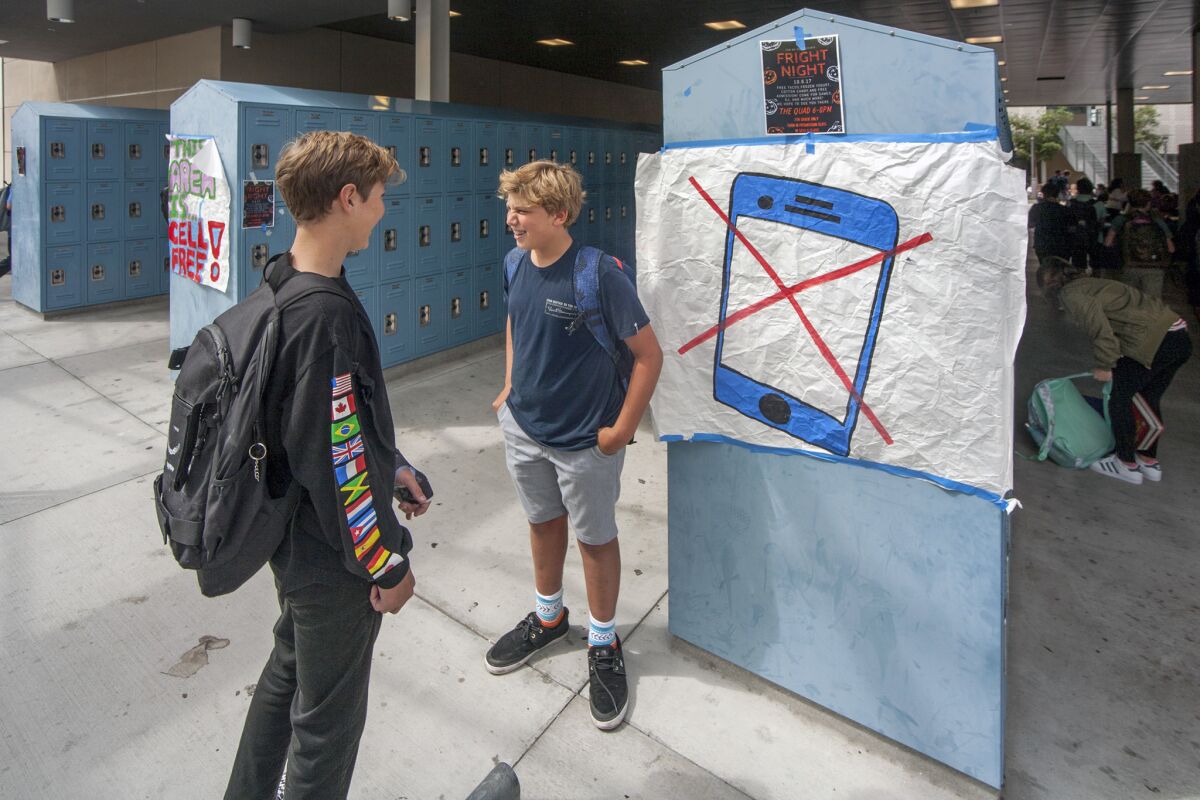 Students in a cellphone-free zone at school