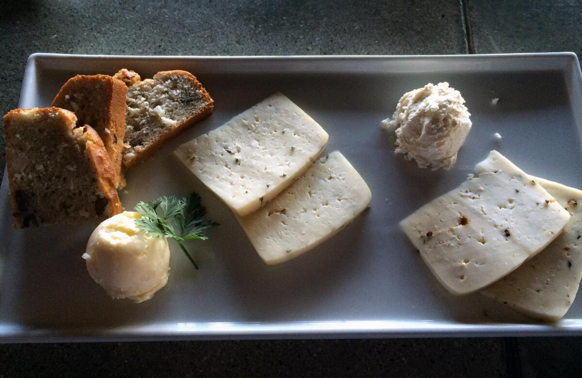 A cheese plate from Convivia, which is located at Encuentro Guadalupe. Photo by Michele Parente